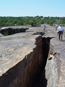 A large section of Dakota Formation slumping away from the main block provides a dramatic hiking experience