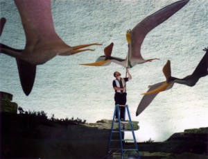 Greg dusts the life-sized models of Pteranodon sternbergii in the Sternberg Museum of Natural History